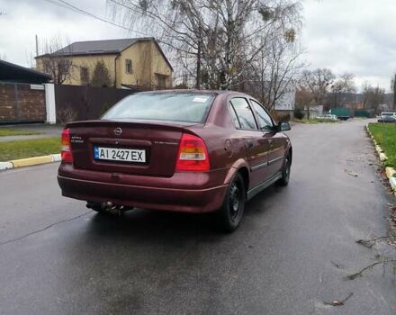 Красный Опель Астра, объемом двигателя 1.36 л и пробегом 327 тыс. км за 2900 $, фото 3 на Automoto.ua