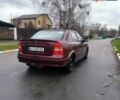 Красный Опель Астра, объемом двигателя 1.36 л и пробегом 327 тыс. км за 2900 $, фото 3 на Automoto.ua