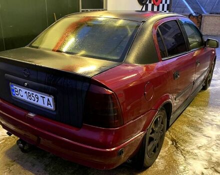 Красный Опель Астра, объемом двигателя 1.4 л и пробегом 313 тыс. км за 3800 $, фото 1 на Automoto.ua