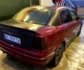 Красный Опель Астра, объемом двигателя 1.4 л и пробегом 313 тыс. км за 3800 $, фото 1 на Automoto.ua