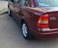 Красный Опель Астра, объемом двигателя 1.4 л и пробегом 226 тыс. км за 4500 $, фото 9 на Automoto.ua