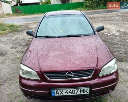 Червоний Опель Астра, об'ємом двигуна 1.6 л та пробігом 285 тис. км за 4800 $, фото 1 на Automoto.ua