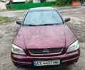 Червоний Опель Астра, об'ємом двигуна 1.6 л та пробігом 285 тис. км за 4800 $, фото 1 на Automoto.ua