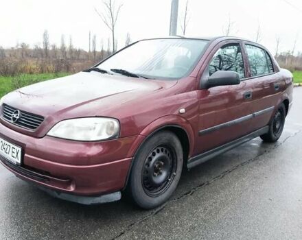 Красный Опель Астра, объемом двигателя 1.36 л и пробегом 327 тыс. км за 2900 $, фото 5 на Automoto.ua