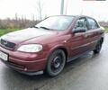 Красный Опель Астра, объемом двигателя 1.36 л и пробегом 327 тыс. км за 2900 $, фото 5 на Automoto.ua