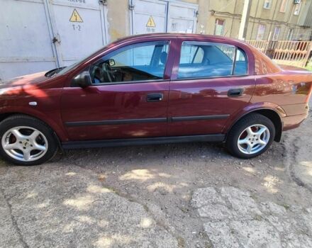 Красный Опель Астра, объемом двигателя 1.4 л и пробегом 226 тыс. км за 4500 $, фото 3 на Automoto.ua