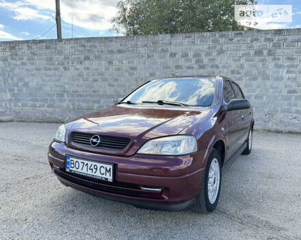 Красный Опель Астра, объемом двигателя 1.4 л и пробегом 183 тыс. км за 4200 $, фото 1 на Automoto.ua