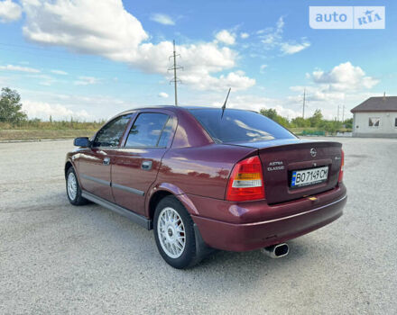Красный Опель Астра, объемом двигателя 1.4 л и пробегом 183 тыс. км за 4200 $, фото 3 на Automoto.ua