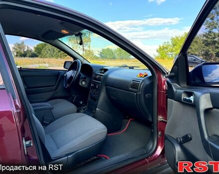 Опель Астра 2006 в Новом Буге на Automoto.ua Красный Опель Астра, объемом двигателя 1.4 л и пробегом 195 тыс. км за 4200 $, фото 11 на Automoto.ua