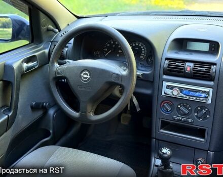 Червоний Опель Астра, об'ємом двигуна 1.4 л та пробігом 180 тис. км за 4000 $, фото 10 на Automoto.ua