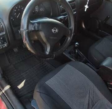 Красный Опель Астра, объемом двигателя 1.4 л и пробегом 297 тыс. км за 2500 $, фото 4 на Automoto.ua