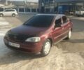 Червоний Опель Астра, об'ємом двигуна 1.4 л та пробігом 240 тис. км за 3599 $, фото 1 на Automoto.ua