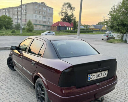 Червоний Опель Астра, об'ємом двигуна 1.4 л та пробігом 380 тис. км за 2850 $, фото 6 на Automoto.ua