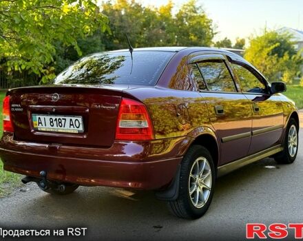 Червоний Опель Астра, об'ємом двигуна 1.4 л та пробігом 180 тис. км за 4000 $, фото 5 на Automoto.ua