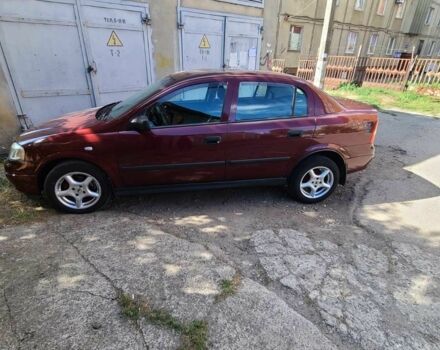 Красный Опель Астра, объемом двигателя 1.4 л и пробегом 226 тыс. км за 4500 $, фото 11 на Automoto.ua