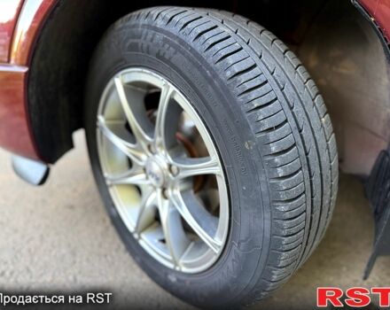 Червоний Опель Астра, об'ємом двигуна 1.4 л та пробігом 180 тис. км за 4000 $, фото 8 на Automoto.ua