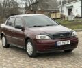 Красный Опель Астра, объемом двигателя 1.4 л и пробегом 245 тыс. км за 3400 $, фото 1 на Automoto.ua
