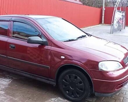 Червоний Опель Астра, об'ємом двигуна 1.4 л та пробігом 207 тис. км за 2500 $, фото 1 на Automoto.ua