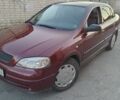 Красный Опель Астра, объемом двигателя 1.39 л и пробегом 207 тыс. км за 3799 $, фото 1 на Automoto.ua