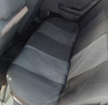 Красный Опель Астра, объемом двигателя 1.4 л и пробегом 297 тыс. км за 2500 $, фото 5 на Automoto.ua