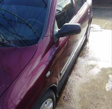 Красный Опель Астра, объемом двигателя 1.4 л и пробегом 297 тыс. км за 2500 $, фото 2 на Automoto.ua