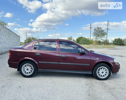 Красный Опель Астра, объемом двигателя 1.4 л и пробегом 183 тыс. км за 4200 $, фото 6 на Automoto.ua