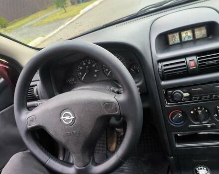 Красный Опель Астра, объемом двигателя 1.36 л и пробегом 327 тыс. км за 2900 $, фото 8 на Automoto.ua
