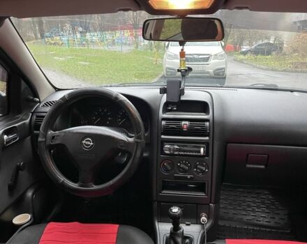 Червоний Опель Астра, об'ємом двигуна 1.4 л та пробігом 208 тис. км за 3600 $, фото 5 на Automoto.ua