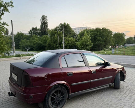 Червоний Опель Астра, об'ємом двигуна 1.4 л та пробігом 380 тис. км за 2850 $, фото 9 на Automoto.ua