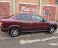 Красный Опель Астра, объемом двигателя 1.4 л и пробегом 245 тыс. км за 3300 $, фото 2 на Automoto.ua