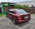 Червоний Опель Астра, об'ємом двигуна 1.6 л та пробігом 285 тис. км за 4200 $, фото 5 на Automoto.ua