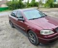 Червоний Опель Астра, об'ємом двигуна 1.6 л та пробігом 285 тис. км за 4200 $, фото 1 на Automoto.ua
