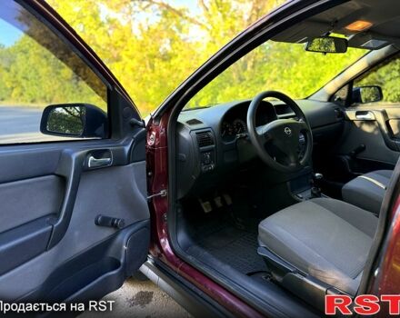 Червоний Опель Астра, об'ємом двигуна 1.4 л та пробігом 180 тис. км за 4000 $, фото 12 на Automoto.ua
