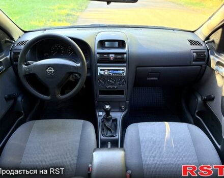 Червоний Опель Астра, об'ємом двигуна 1.4 л та пробігом 180 тис. км за 4000 $, фото 11 на Automoto.ua