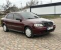 Красный Опель Астра, объемом двигателя 1.4 л и пробегом 245 тыс. км за 3400 $, фото 5 на Automoto.ua