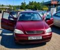 Червоний Опель Астра, об'ємом двигуна 1.4 л та пробігом 294 тис. км за 2600 $, фото 1 на Automoto.ua