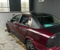 Червоний Опель Астра, об'ємом двигуна 1.4 л та пробігом 300 тис. км за 2600 $, фото 4 на Automoto.ua