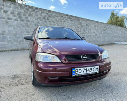 Красный Опель Астра, объемом двигателя 1.4 л и пробегом 183 тыс. км за 4200 $, фото 8 на Automoto.ua
