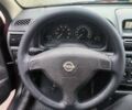 Красный Опель Астра, объемом двигателя 1.36 л и пробегом 327 тыс. км за 2900 $, фото 7 на Automoto.ua