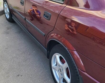 Красный Опель Астра, объемом двигателя 1.4 л и пробегом 226 тыс. км за 4500 $, фото 7 на Automoto.ua