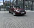 Красный Опель Астра, объемом двигателя 1.4 л и пробегом 144 тыс. км за 3700 $, фото 1 на Automoto.ua