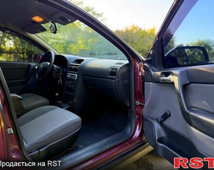 Червоний Опель Астра, об'ємом двигуна 1.4 л та пробігом 180 тис. км за 4000 $, фото 7 на Automoto.ua