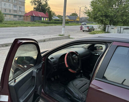 Червоний Опель Астра, об'ємом двигуна 1.4 л та пробігом 380 тис. км за 2850 $, фото 12 на Automoto.ua