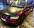Красный Опель Астра, объемом двигателя 1.4 л и пробегом 313 тыс. км за 3800 $, фото 4 на Automoto.ua