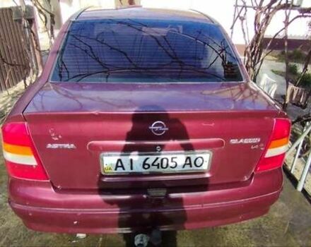 Красный Опель Астра, объемом двигателя 1.4 л и пробегом 297 тыс. км за 2500 $, фото 9 на Automoto.ua