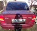 Красный Опель Астра, объемом двигателя 1.4 л и пробегом 297 тыс. км за 2500 $, фото 9 на Automoto.ua