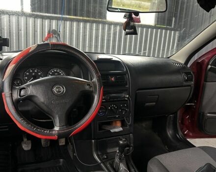 Червоний Опель Астра, об'ємом двигуна 1.4 л та пробігом 300 тис. км за 2600 $, фото 5 на Automoto.ua