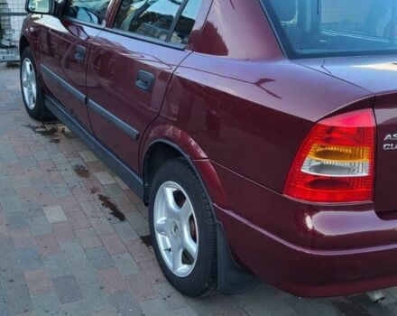 Красный Опель Астра, объемом двигателя 1.4 л и пробегом 226 тыс. км за 4500 $, фото 4 на Automoto.ua