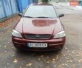 Красный Опель Астра, объемом двигателя 1.4 л и пробегом 280 тыс. км за 2300 $, фото 1 на Automoto.ua