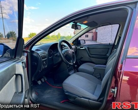 Опель Астра 2006 в Новом Буге на Automoto.ua Красный Опель Астра, объемом двигателя 1.4 л и пробегом 195 тыс. км за 4200 $, фото 12 на Automoto.ua